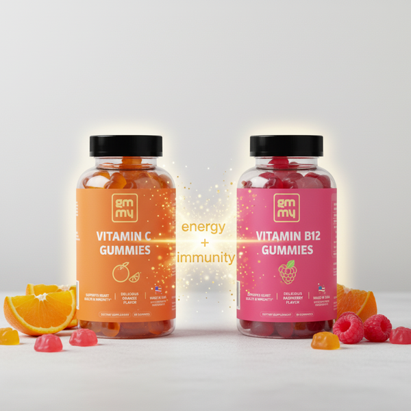 Two bottles of gummy vitamins, one orange and one pink, on a light gray background.